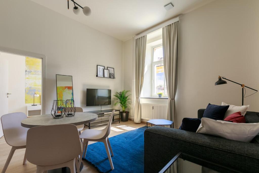 TV a/nebo společenská místnost v ubytování Avantgarde apartments