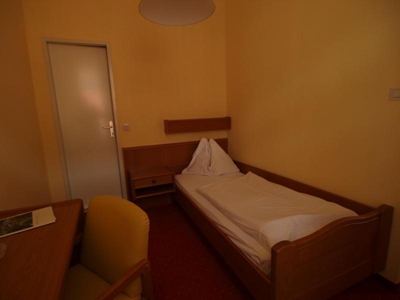 Postel nebo postele na pokoji v ubytování Hotel Drei Hasen