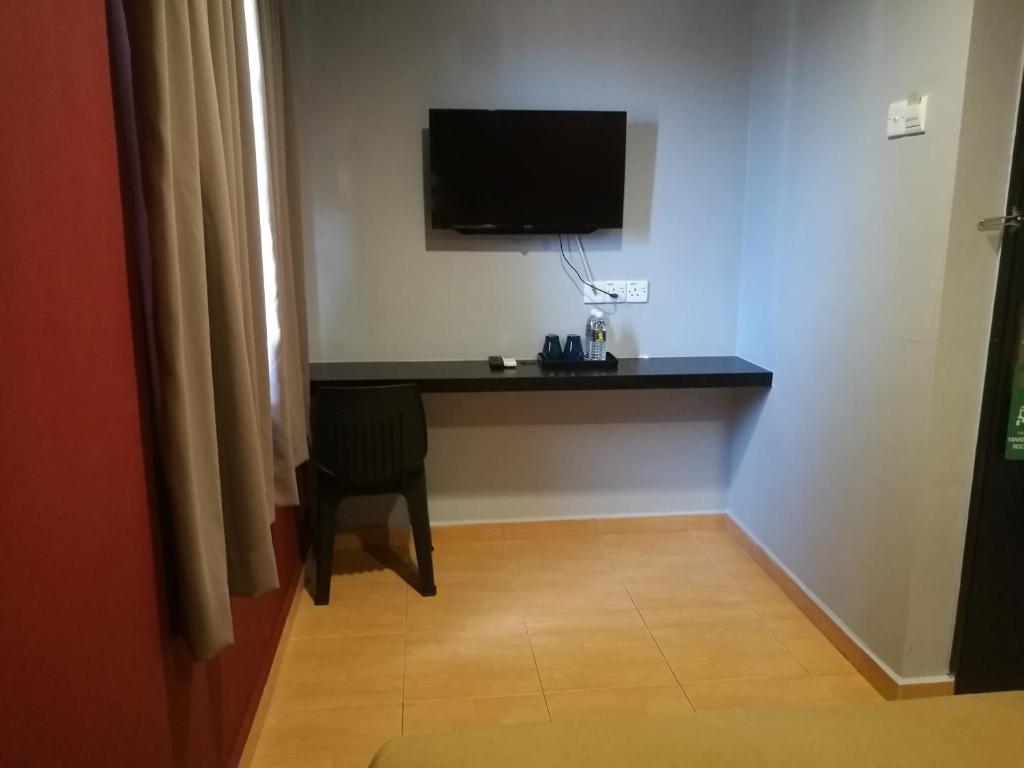 TV a/nebo společenská místnost v ubytování Grandpa Hotel