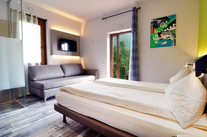 Postel nebo postele na pokoji v ubytování Casa Antonelli