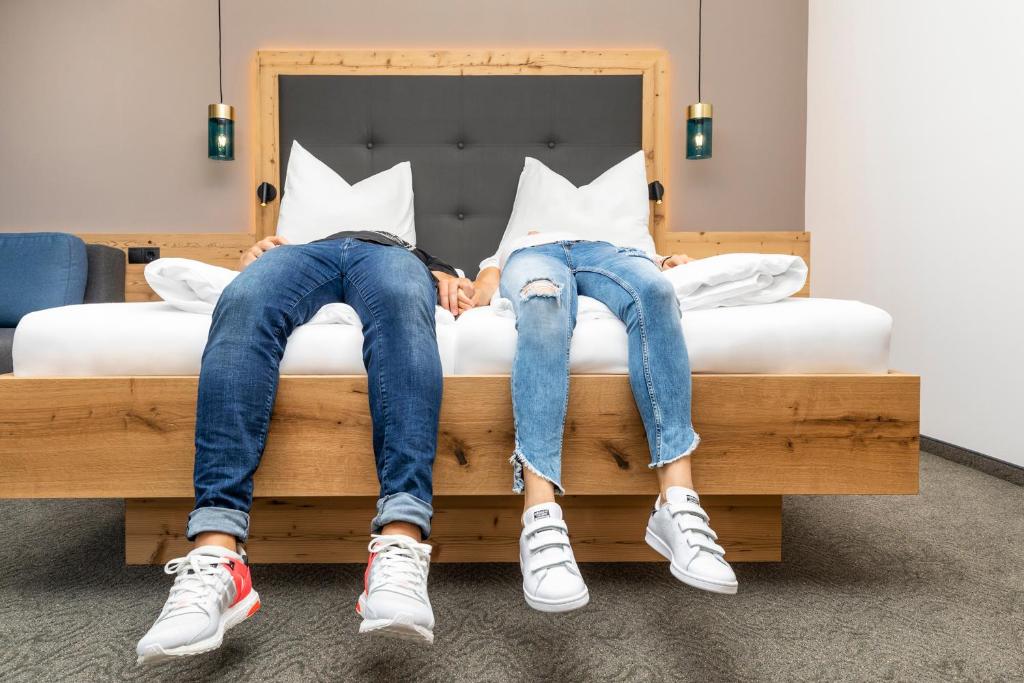 Postel nebo postele na pokoji v ubytování Hotel Forellenhof