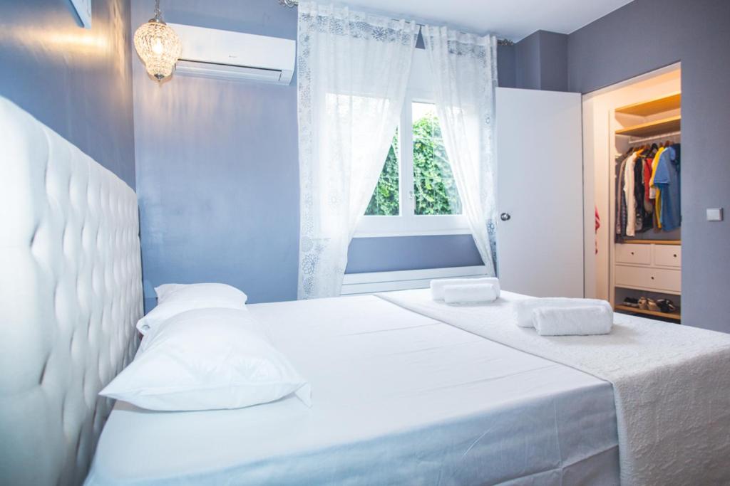 A bed or beds in a room at CS1 Villa de lujo a 500 metros de la playa de Sant Pol