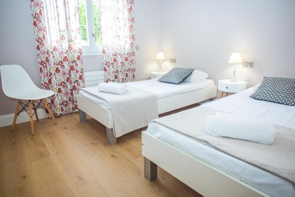 A bed or beds in a room at CS1 Villa de lujo a 500 metros de la playa de Sant Pol
