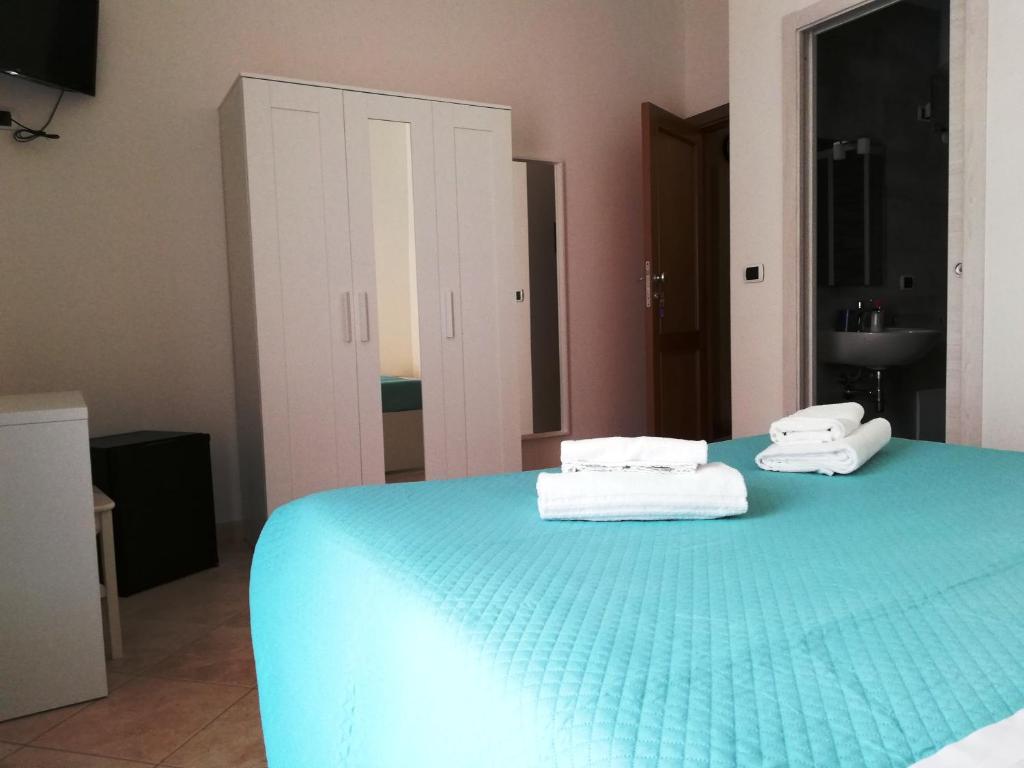 Posteľ alebo postele v izbe v ubytovaní DOMO ALGHERO CENTRO