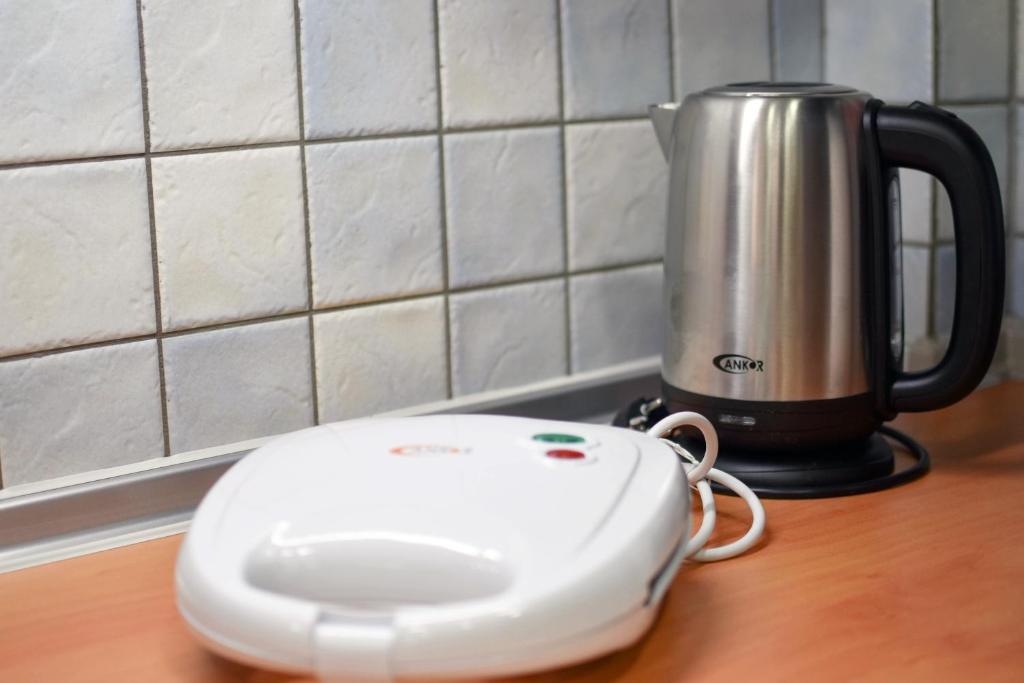 Príslušenstvo na prípravu kávy alebo čaju v ubytovaní OLIVER SUITES