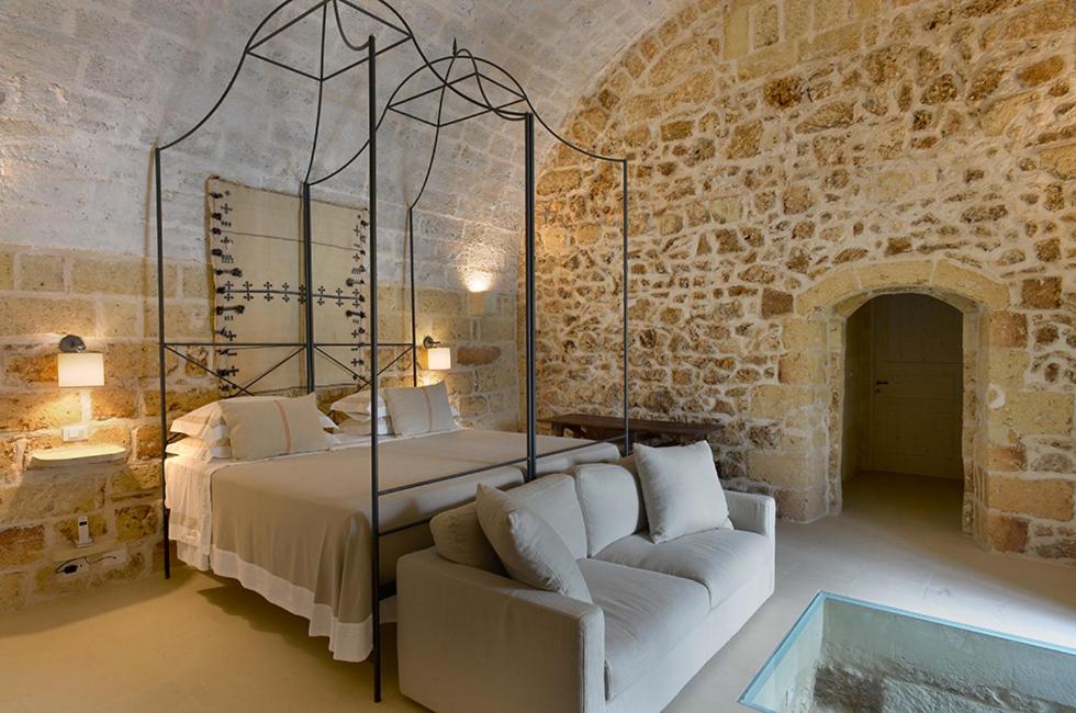 Postel nebo postele na pokoji v ubytování Masseria Trapana