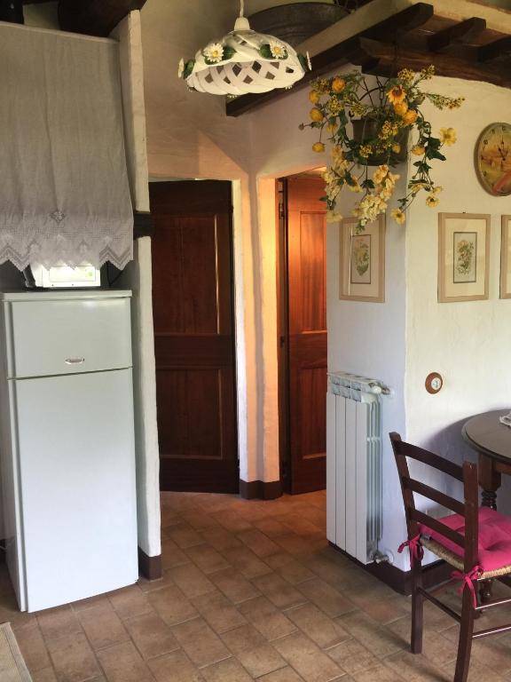 Kuchyň nebo kuchyňský kout v ubytování Romantico Cottage