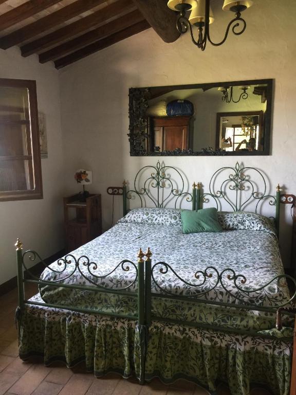 Postel nebo postele na pokoji v ubytování Romantico Cottage