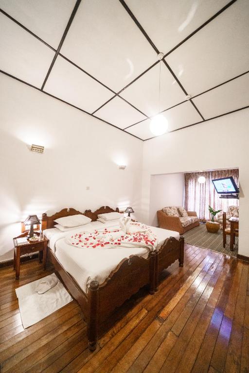Postel nebo postele na pokoji v ubytování Hotel Glendower