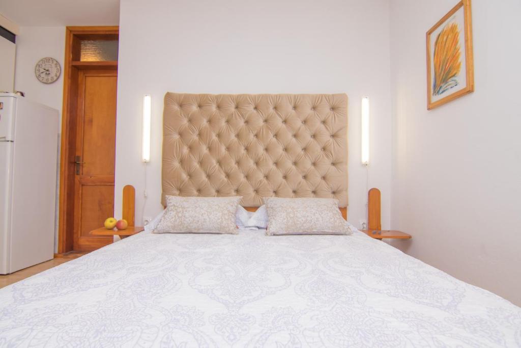 Posteľ alebo postele v izbe v ubytovaní Apartmani VILLA KALINIC