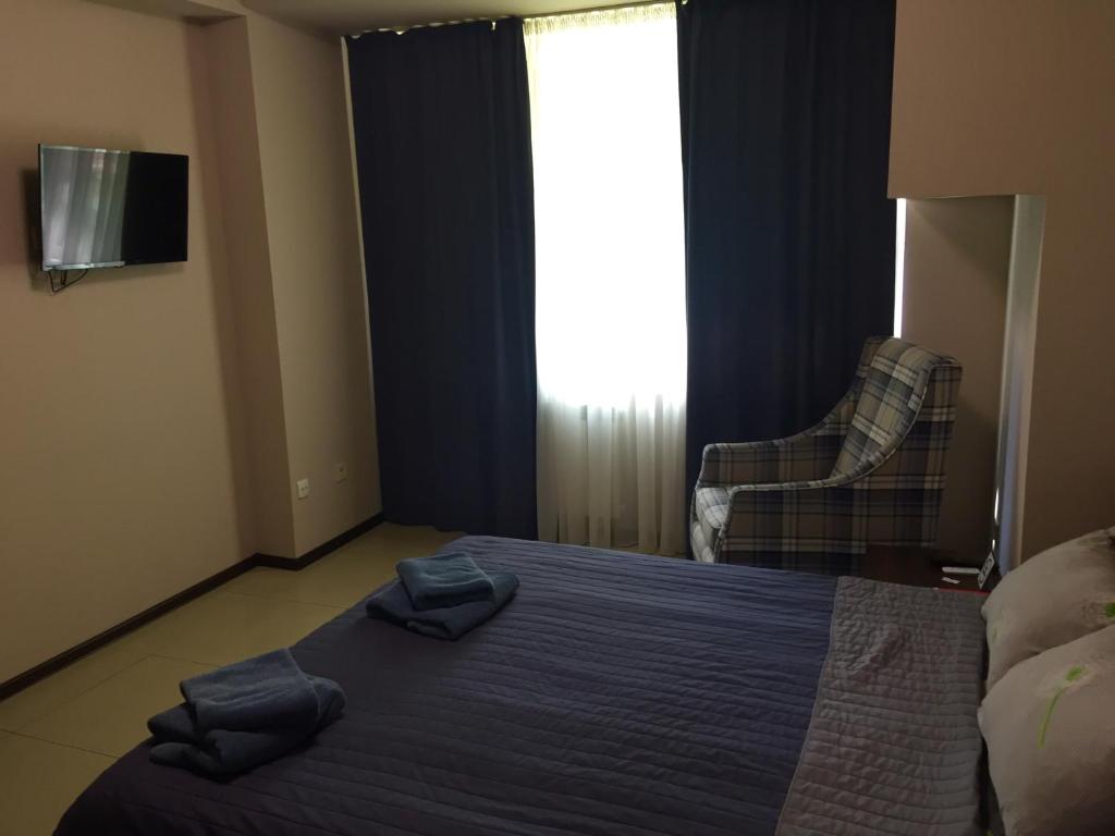 TV a/nebo společenská místnost v ubytování Westend Hotel Kyiv