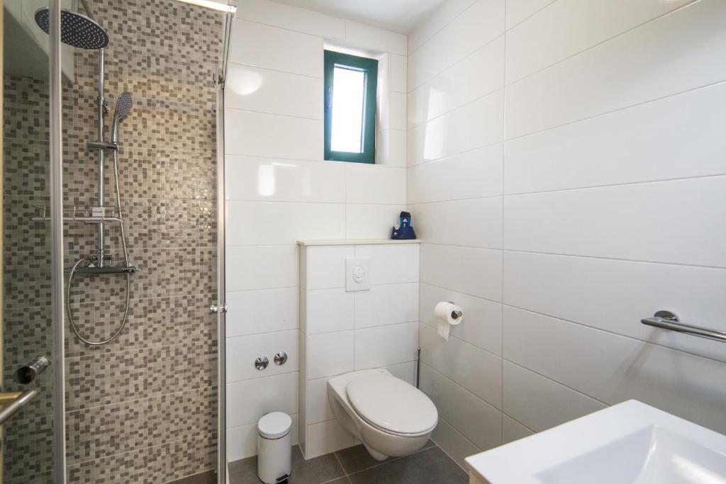 Kúpeľňa v ubytovaní Apartmani Ujdur