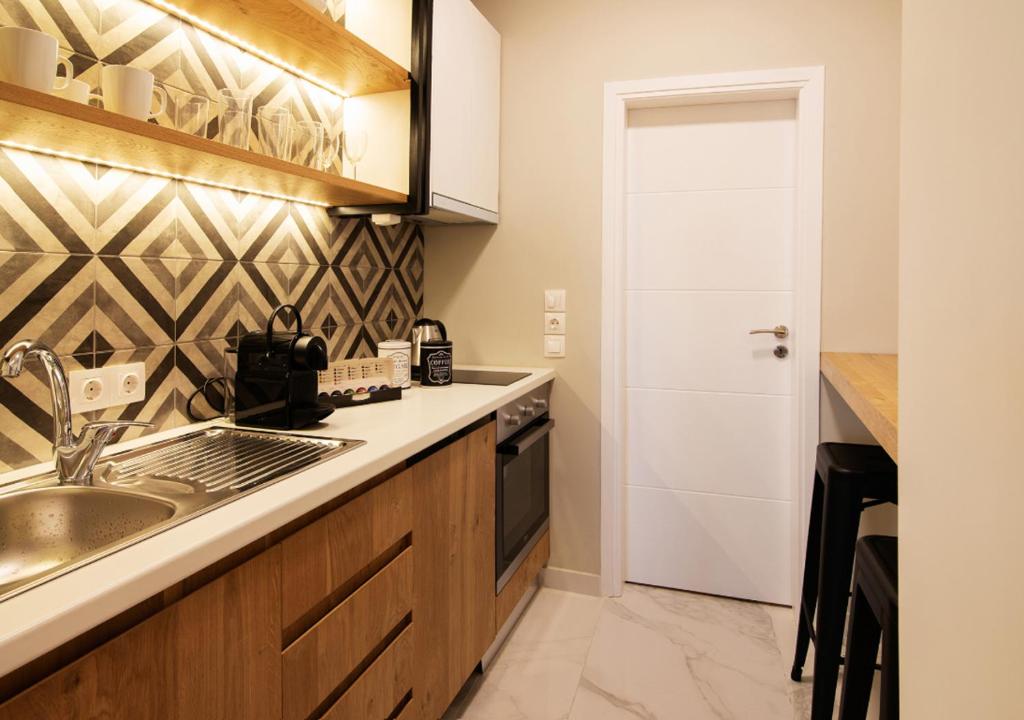 Kuchyň nebo kuchyňský kout v ubytování Pame Rentals - Charming Central Studio