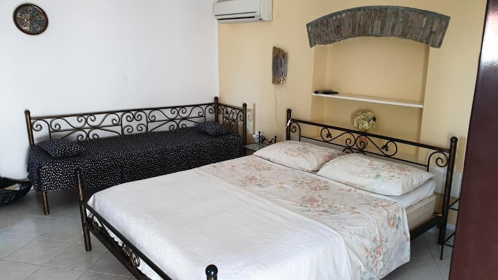 Posteľ alebo postele v izbe v ubytovaní Appartment Daniela Funtana