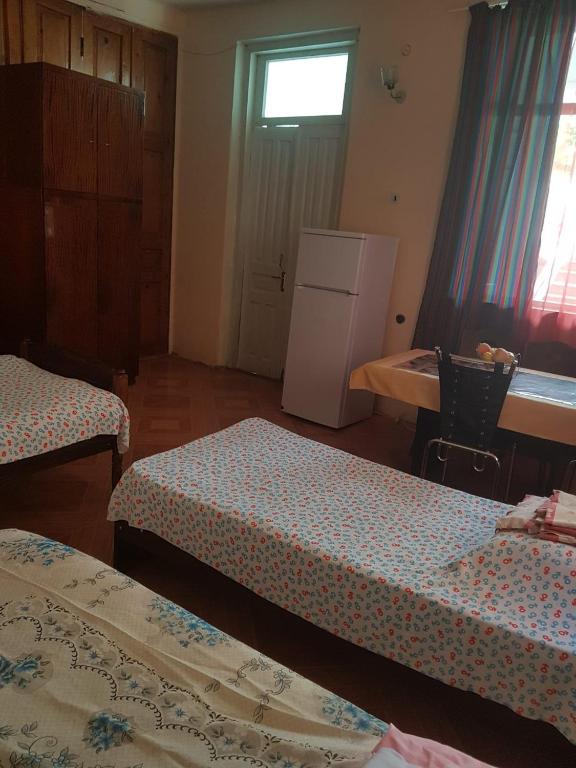 Postel nebo postele na pokoji v ubytování Kobuleti Egro House
