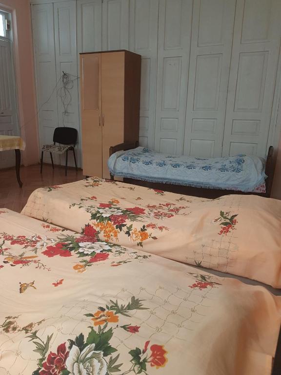 Postel nebo postele na pokoji v ubytování Kobuleti Egro House