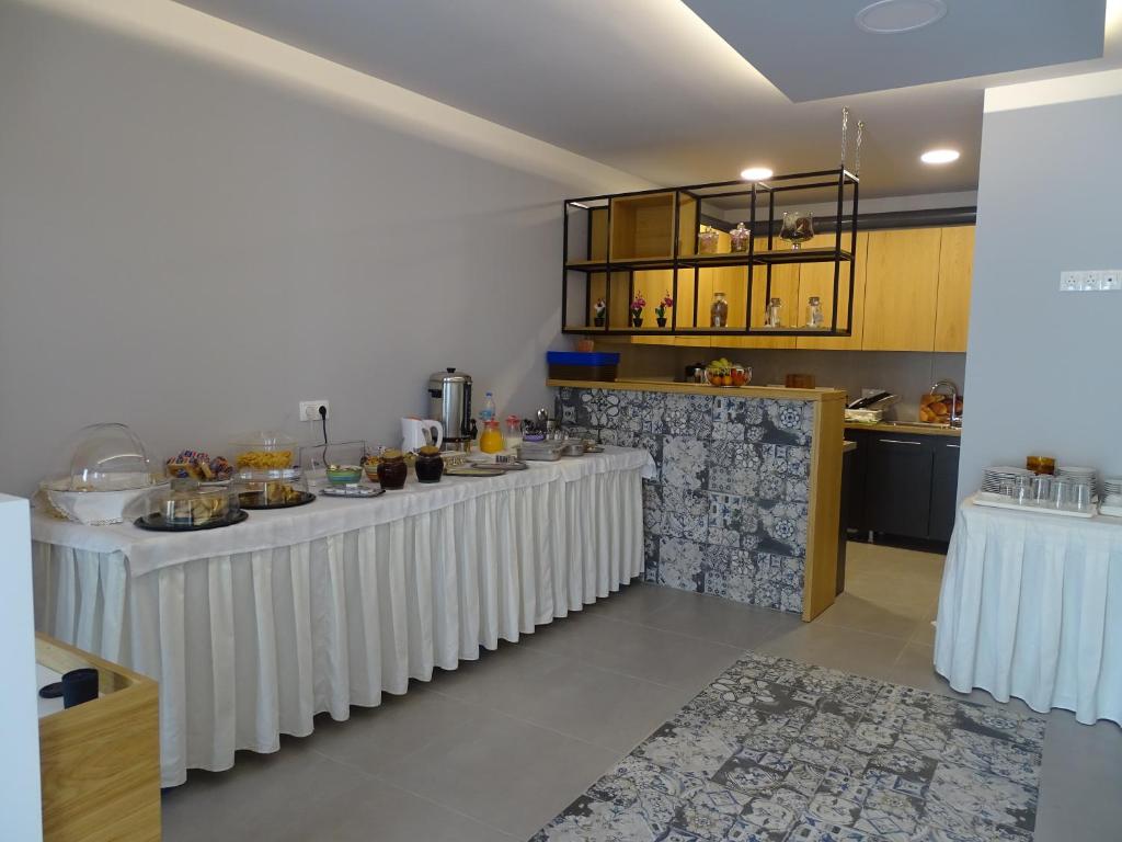 Kuchyň nebo kuchyňský kout v ubytování Galini Hellenic Hospitality