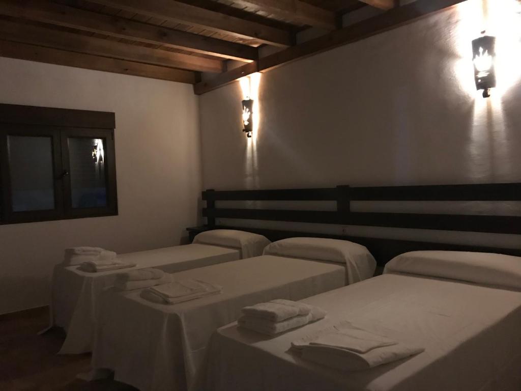 Postel nebo postele na pokoji v ubytování VTAR Don Benito, su casa rural en Gilena