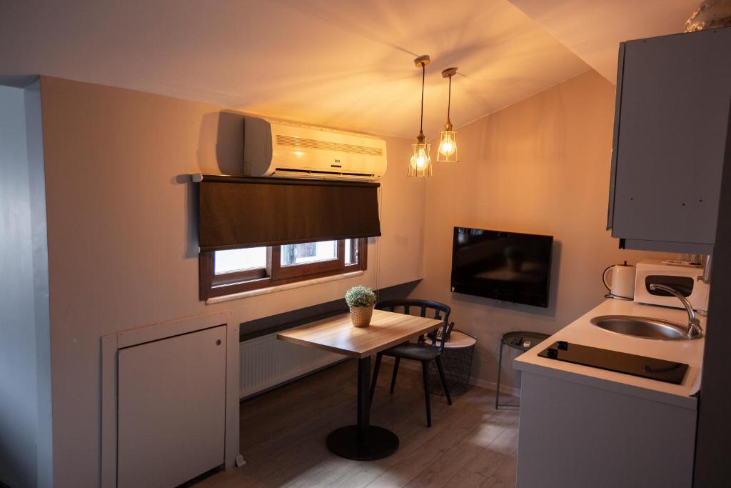 A kitchen or kitchenette at Cityloft 36