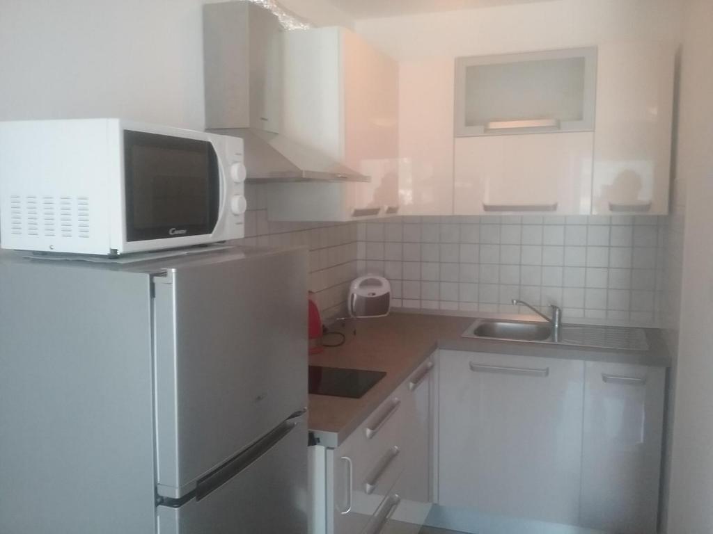 Kuchnia lub aneks kuchenny w obiekcie Apartman zarok