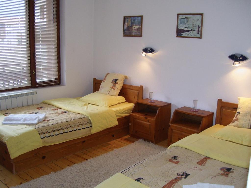 Postel nebo postele na pokoji v ubytování Rahoff hotel