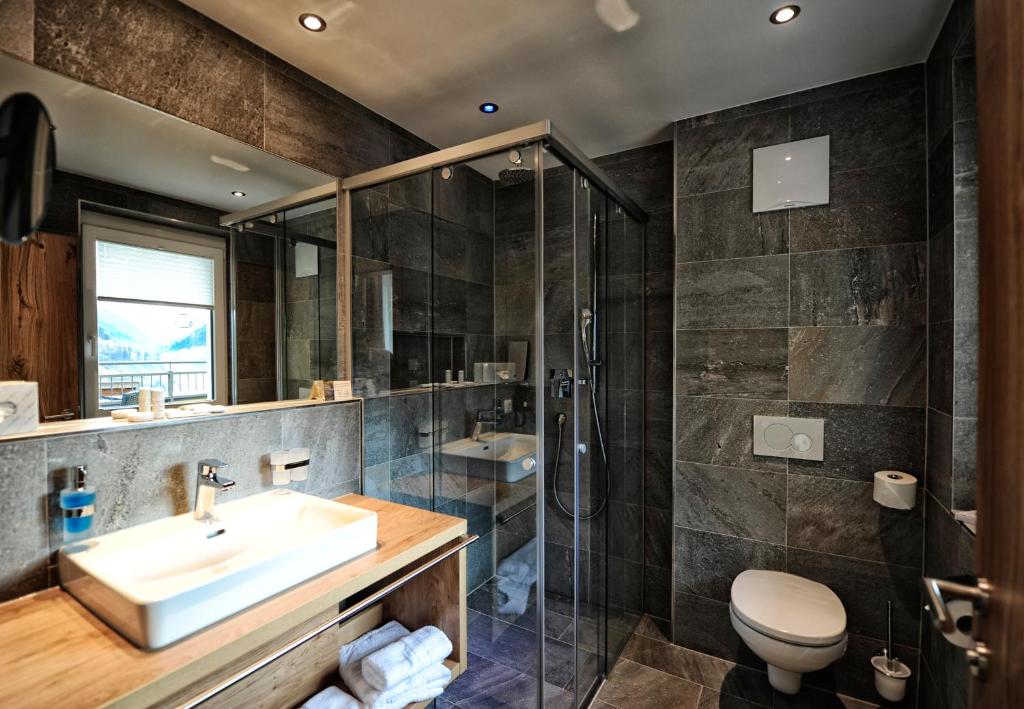 Koupelna v ubytování Hotel Dorfstadl