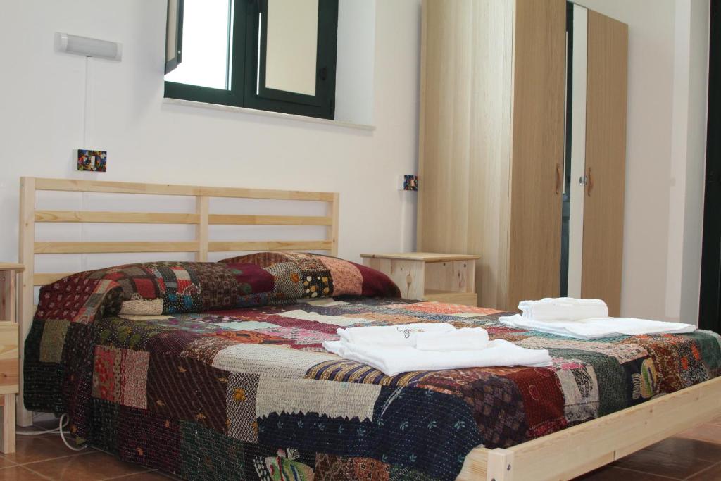 Posteľ alebo postele v izbe v ubytovaní Beteyà Hostel Don Bosco