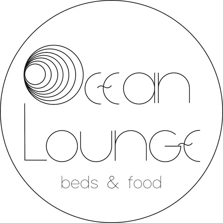 a black and white logo for aeds and food at Ocean Lounge in Altea
