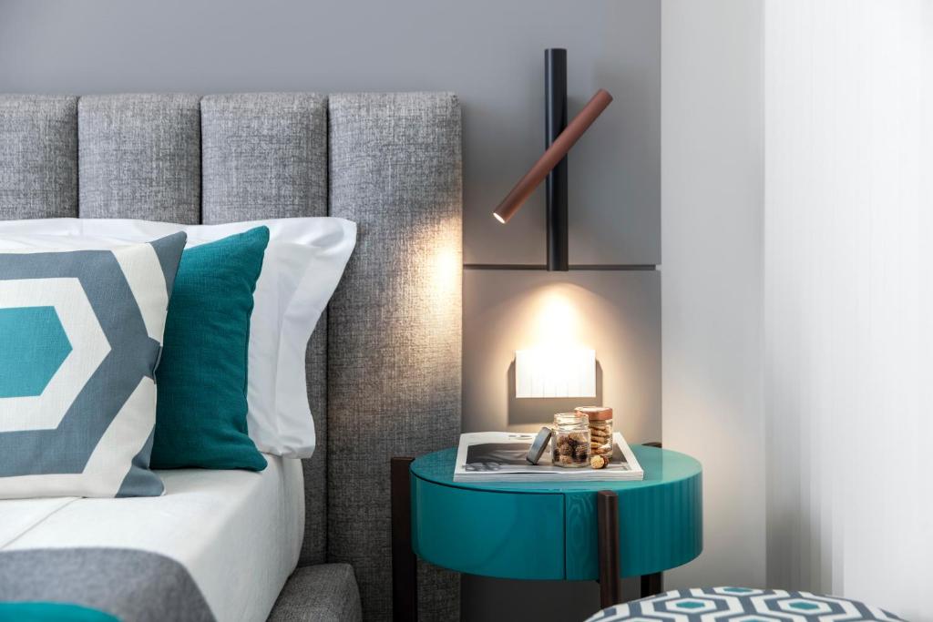 Postel nebo postele na pokoji v ubytování Hotel Plaza e de Russie - Relais & Châteaux