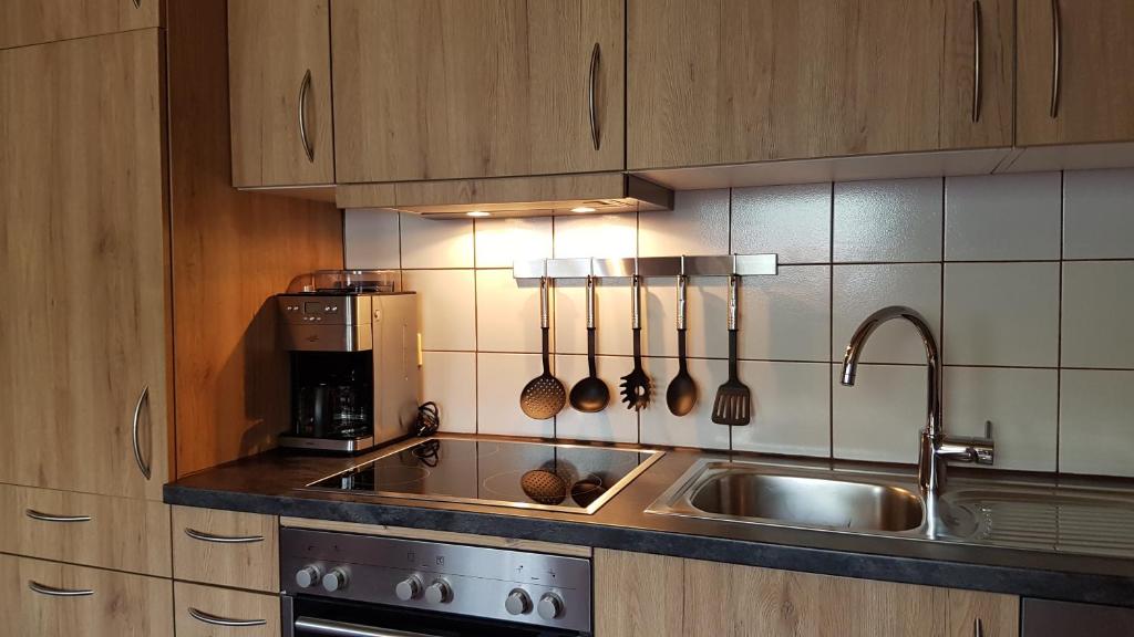Kuchyň nebo kuchyňský kout v ubytování Appartements Burtscher