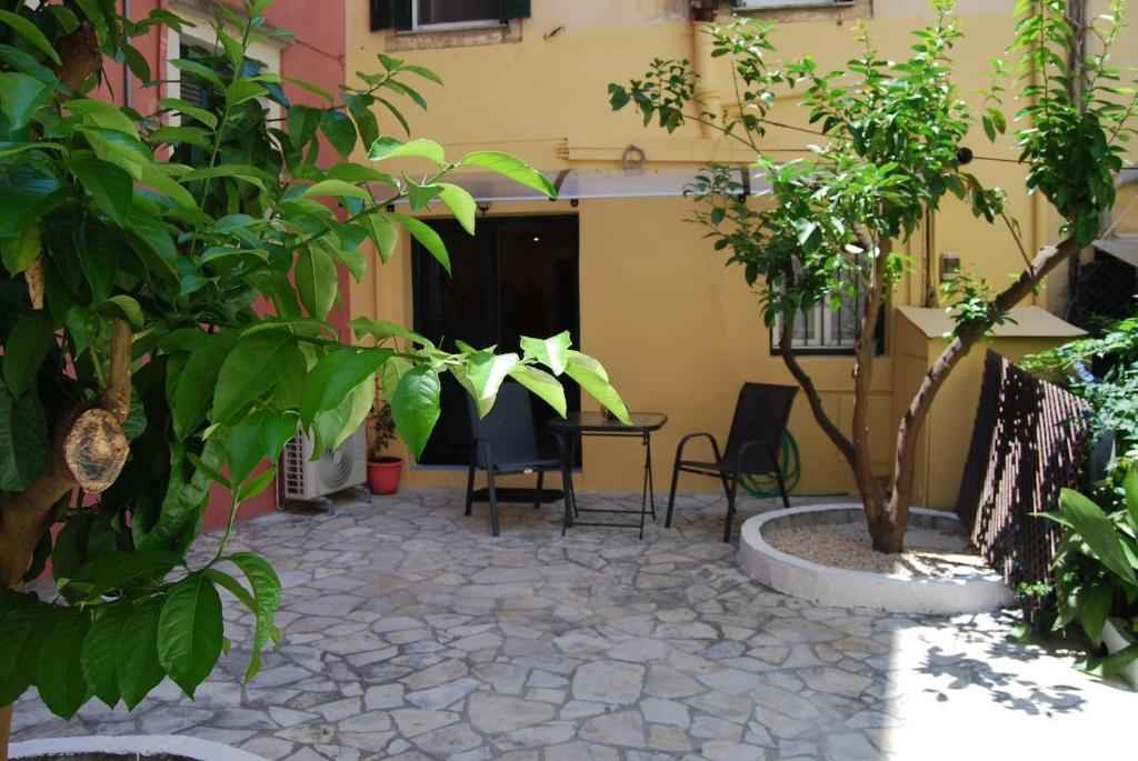 A garden outside Old Town Venetian Studio by CorfuEscapes