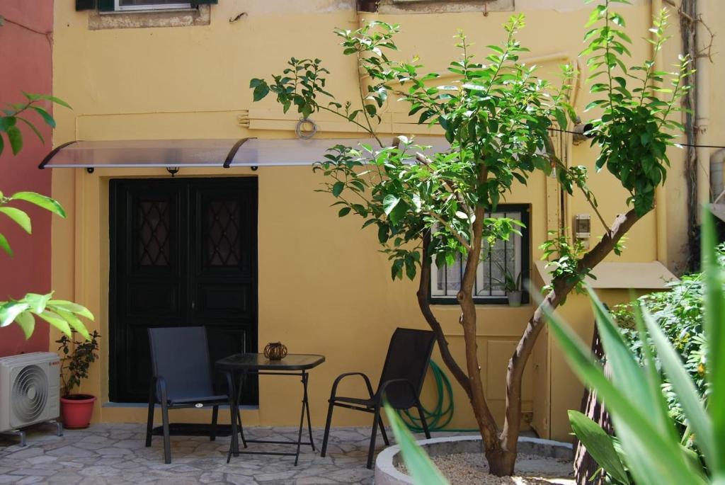 A garden outside Old Town Venetian Studio by CorfuEscapes