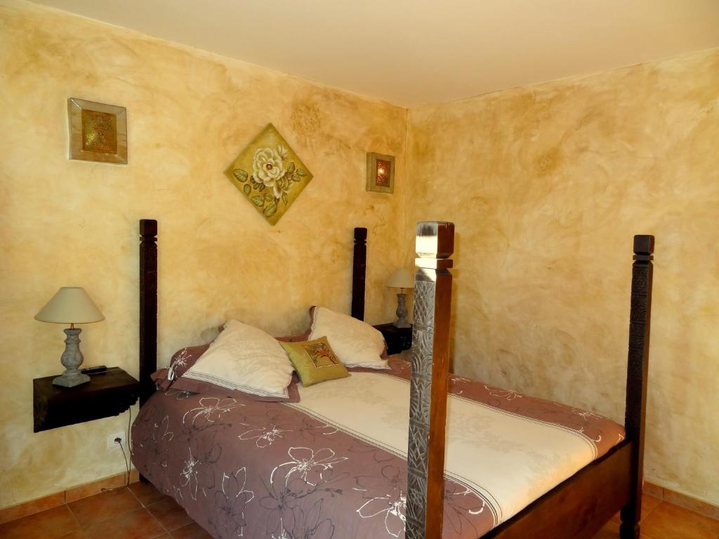 Postel nebo postele na pokoji v ubytování La Bastide de Font Clarette