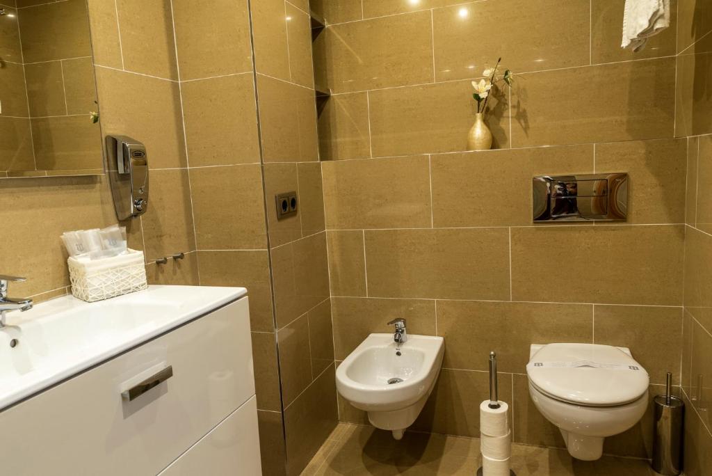 Koupelna v ubytování Apartaments Delfin