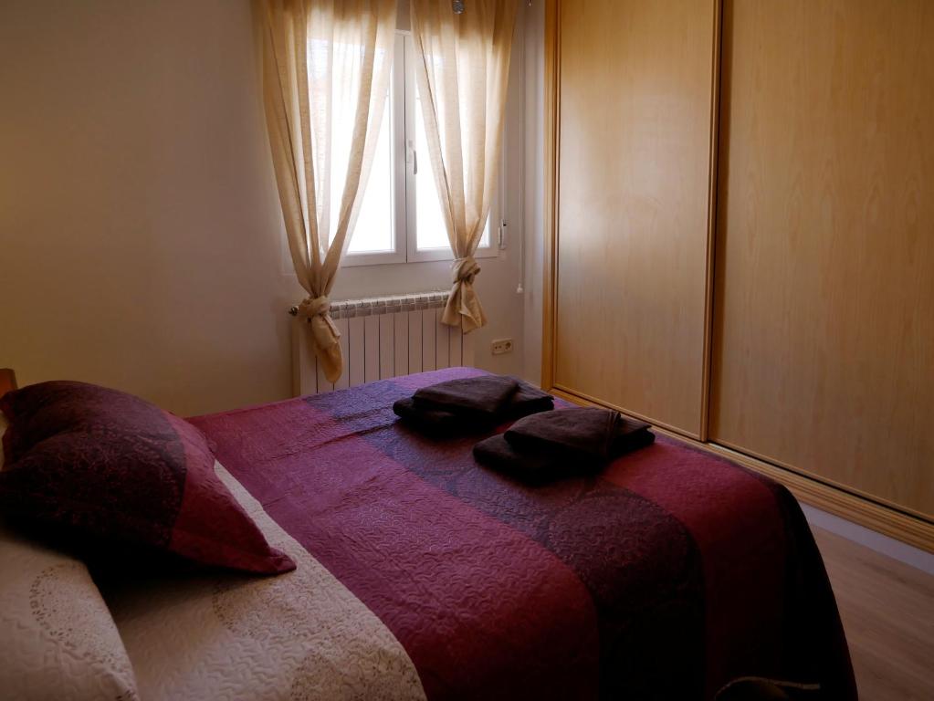 Postel nebo postele na pokoji v ubytování Casa Rural el Reencuentro "Grupo Mirando a Gredos"