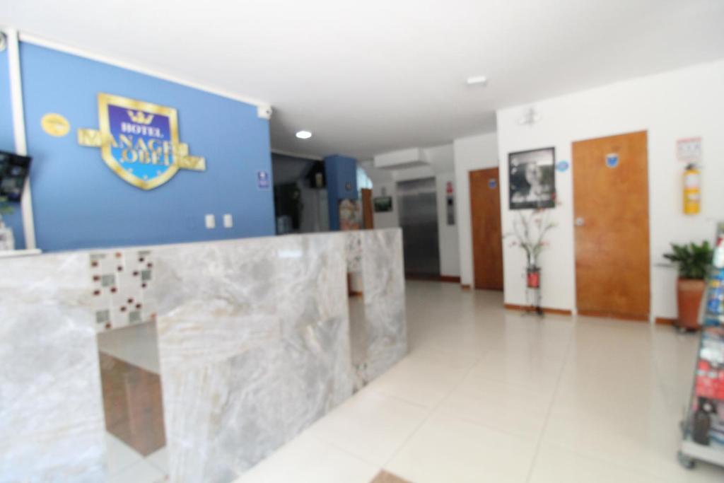 Kuchyň nebo kuchyňský kout v ubytování HOTEL MANAGER OBELISK