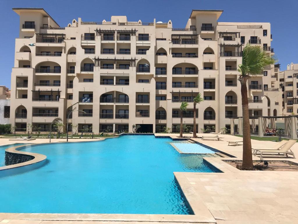 The swimming pool at or close to AlDau Heights Apartments