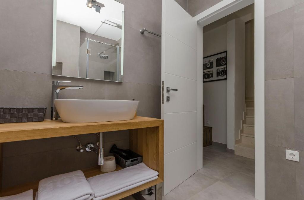 Kúpeľňa v ubytovaní Apartments Villa Adriana II