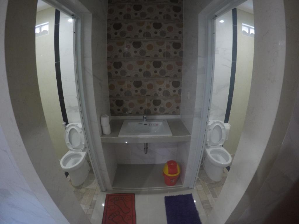 Koupelna v ubytování Jepun Segara Guest House