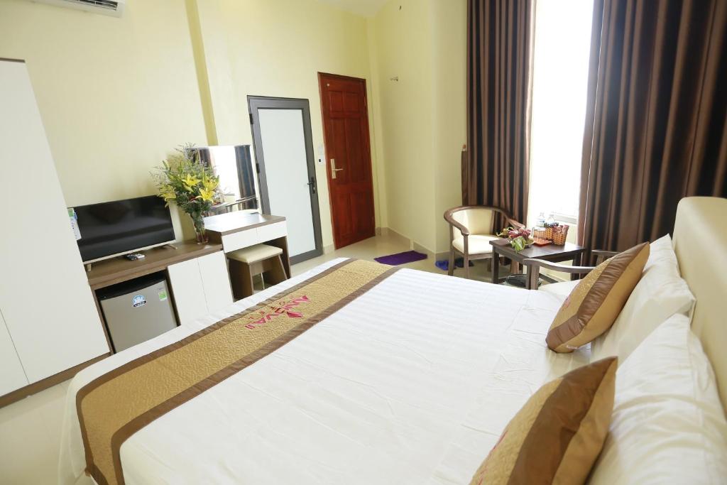 Postel nebo postele na pokoji v ubytování Anova 2 Hotel