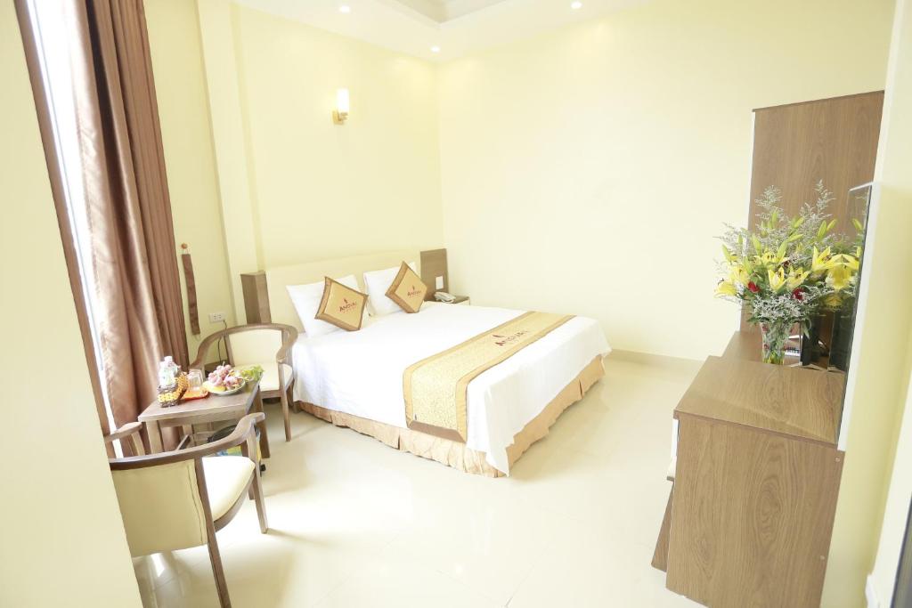 Postel nebo postele na pokoji v ubytování Anova 2 Hotel