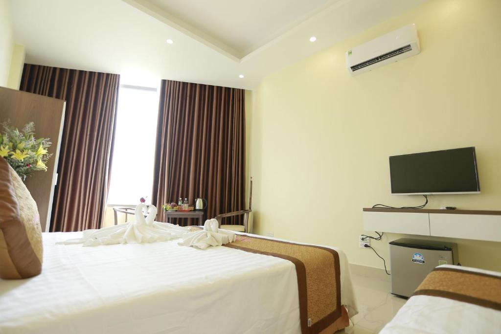 TV a/nebo společenská místnost v ubytování Anova 2 Hotel