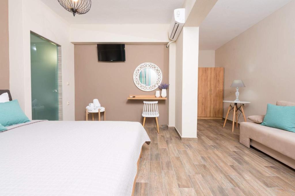 Postel nebo postele na pokoji v ubytování Hotel Stefanos