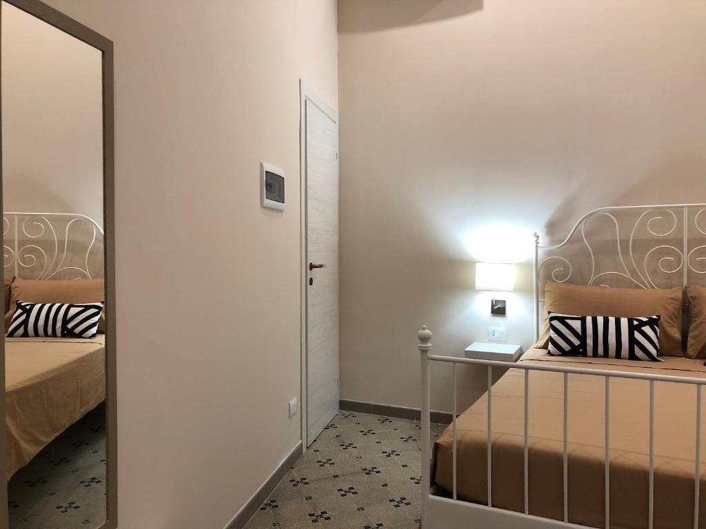 Postel nebo postele na pokoji v ubytování B&B Meliora Rooms