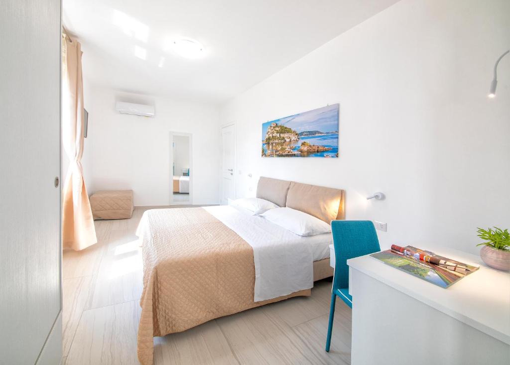 Postel nebo postele na pokoji v ubytování B&B La Gioia