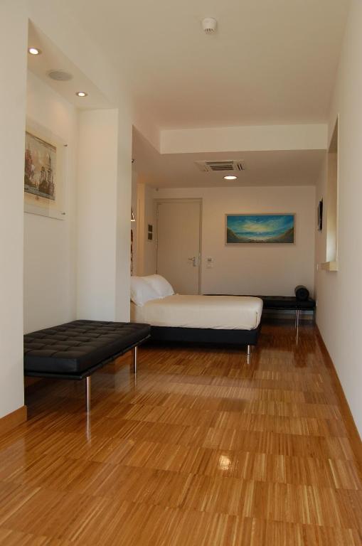 Postel nebo postele na pokoji v ubytování Hotel Del Conte