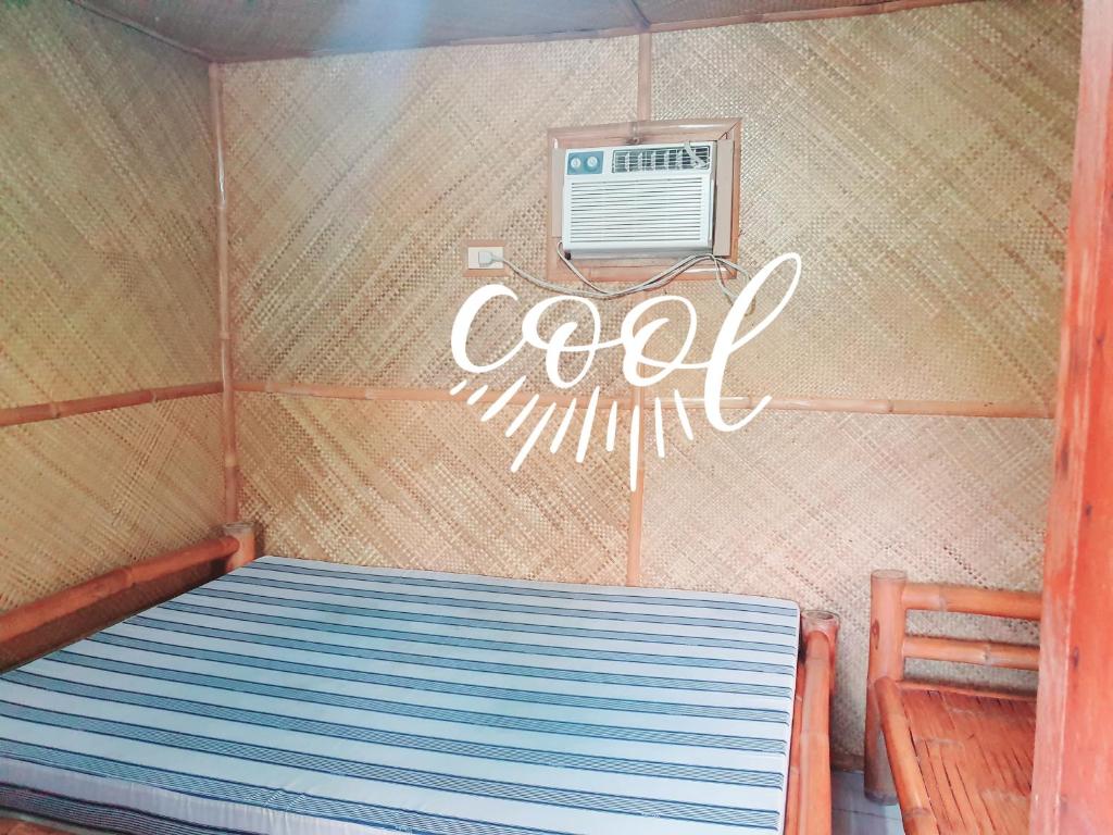 Postel nebo postele na pokoji v ubytování Pareja Tourist Inn