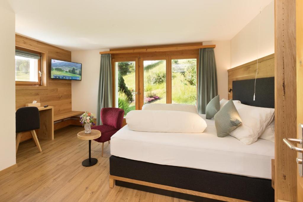 TV a/nebo společenská místnost v ubytování Boutique-Hotel Vincenz