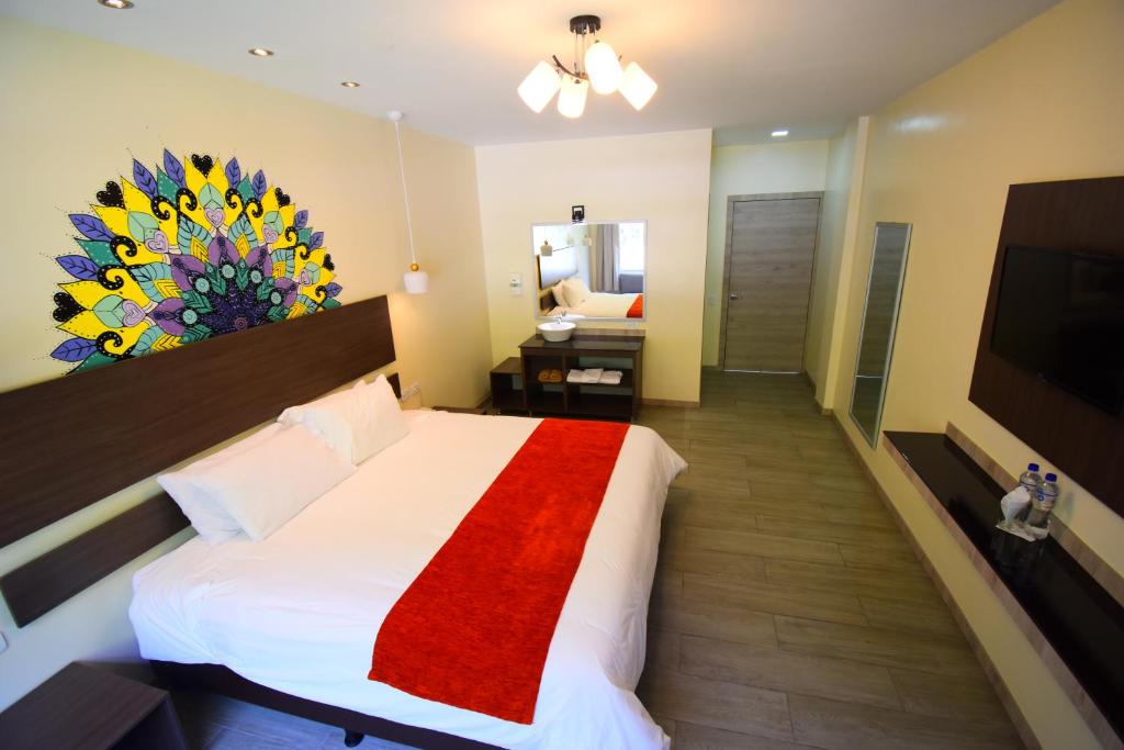 Postel nebo postele na pokoji v ubytování Monte Selva Hotel Spa Termal
