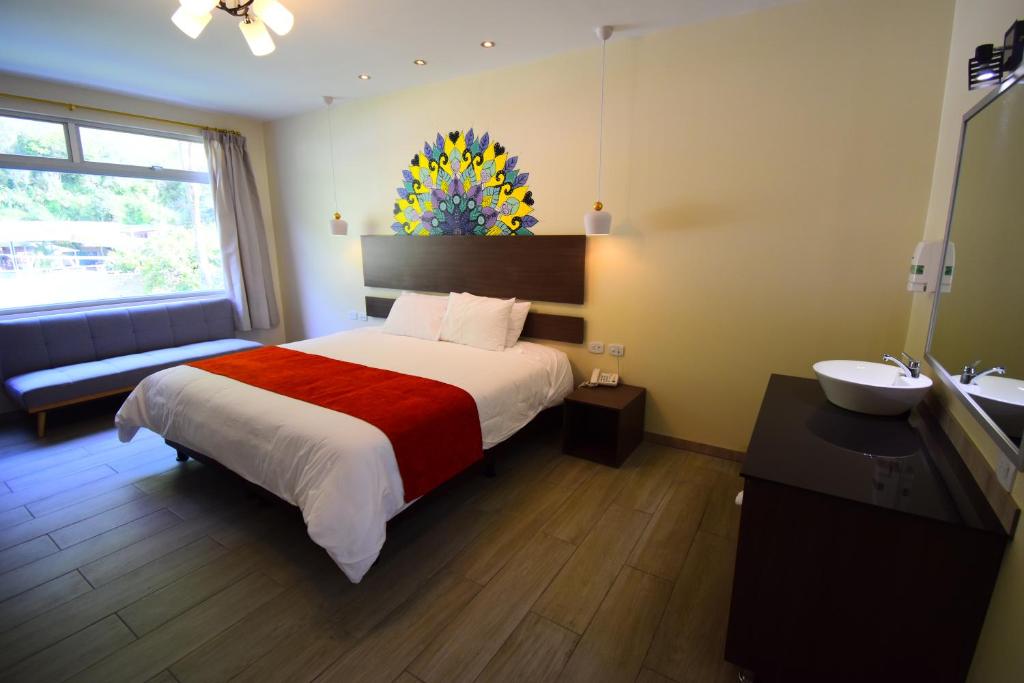 Postel nebo postele na pokoji v ubytování Monte Selva Hotel Spa Termal